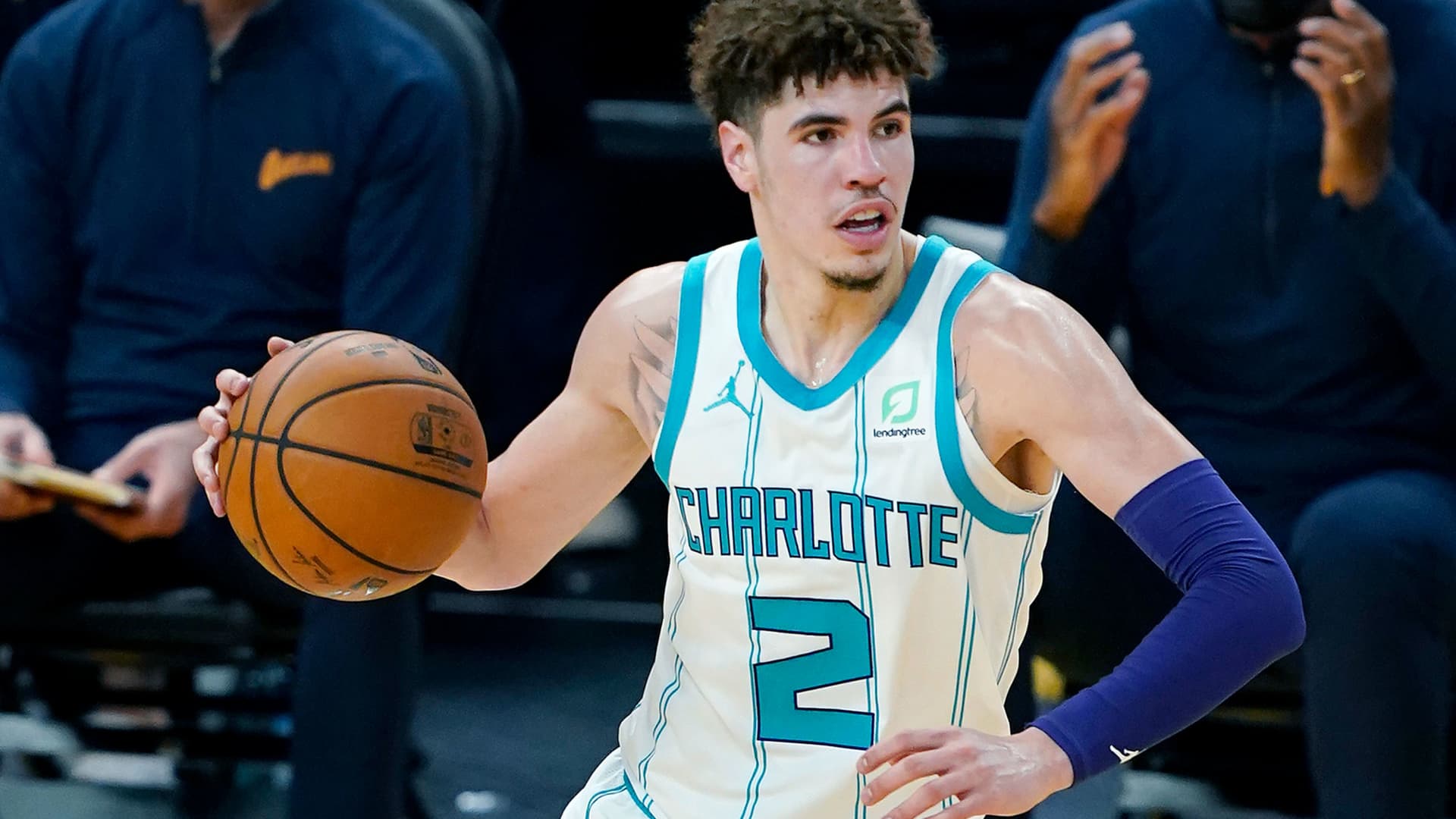 LaMelo Ball #2 of the Charlotte Hornets dribbles the ball up court against the Golden State Warriors during the first half of an NBA basketball game at Chase Center on February 26, 2021 in San Francisco, California.