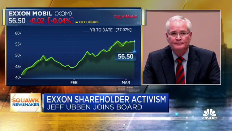 Exxon CEO Darren Woods on protecting dividend, additions to the board