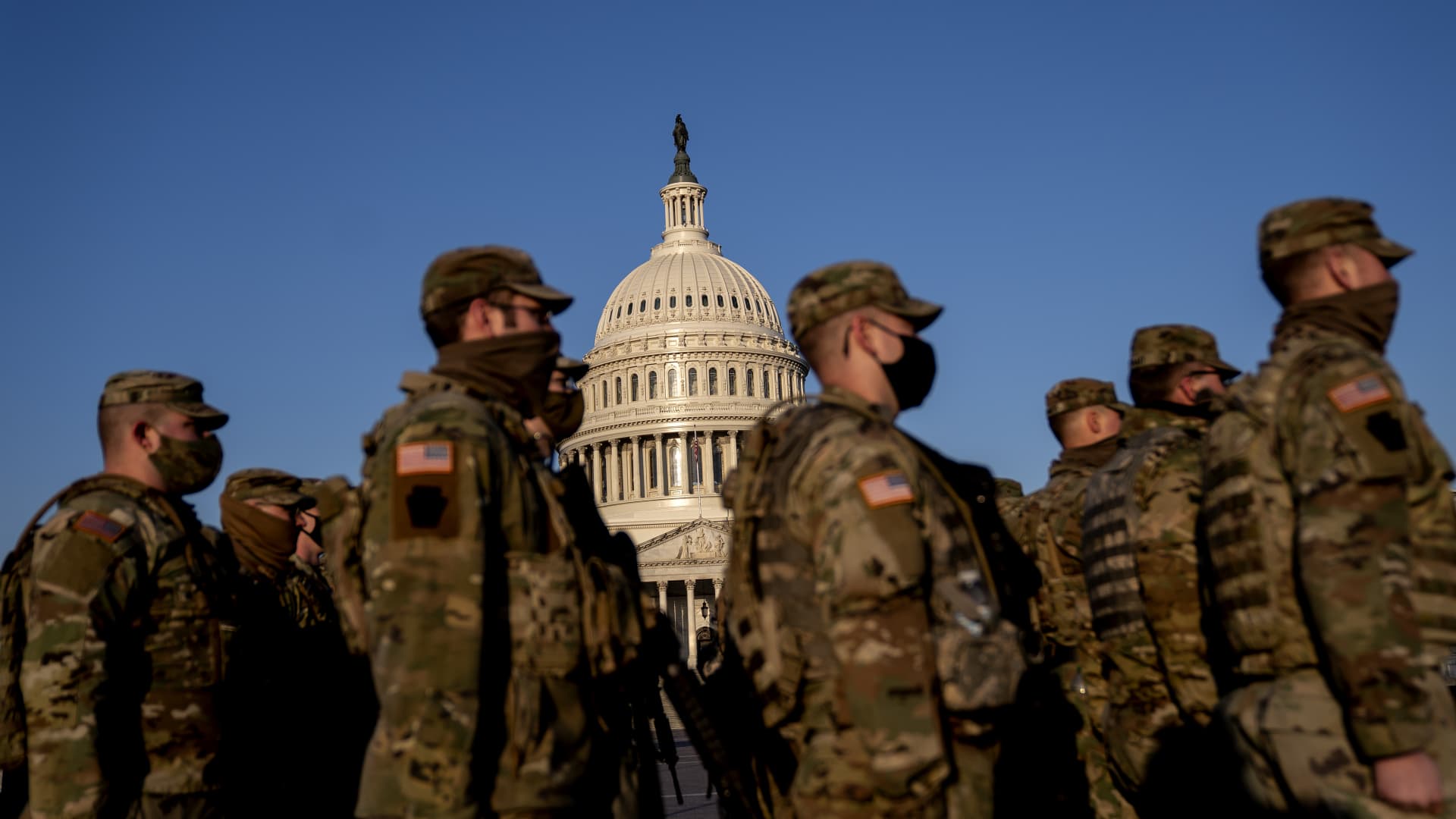Members of the National Guard gather outside the U.S. Capitol in Washington, D.C., U.S., on Thursday, March 4, 2021.