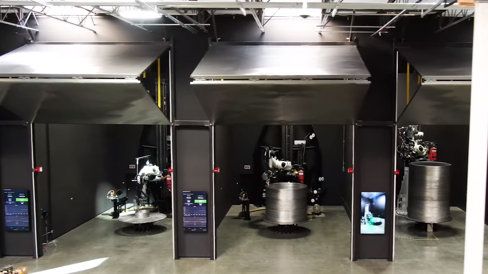 The row of two-story tall 3D printer bays at the company's headquarters.
