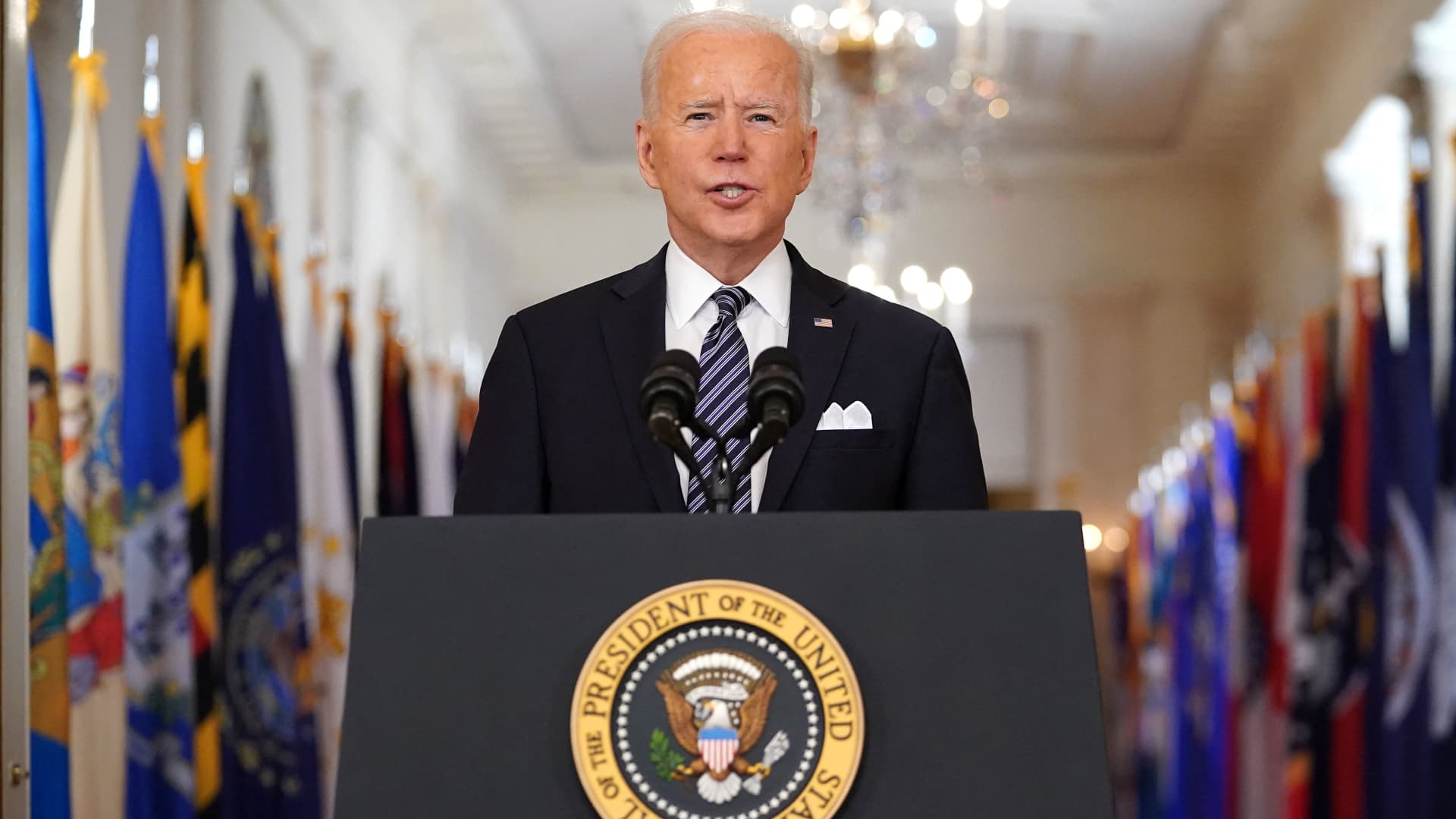 US President Joe Biden speaks on the anniversary of the start of the Covid-19 pandemic, in the East Room of the White House in Washington, DC on March 11, 2021.