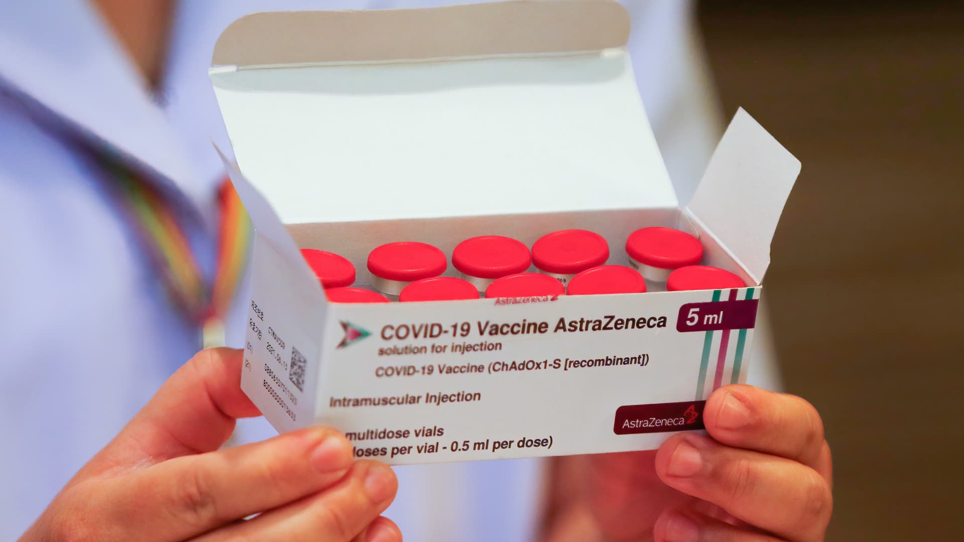 A health worker holds a box of the AstraZeneneca vaccine at the Bamrasnaradura Infectious Diseases Institute in Nonthaburi province on the outskirts of Bangkok.