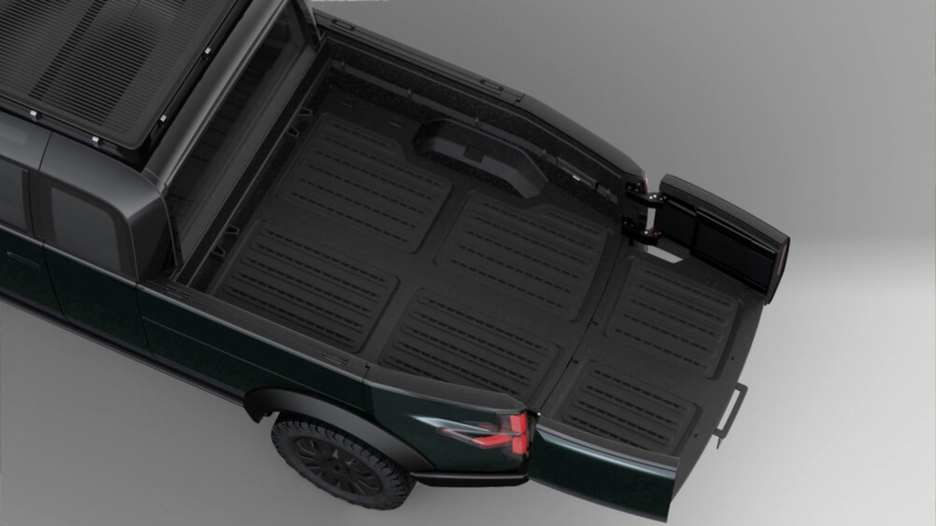 Canoo's new electric pickup features an extendable rear cargo bed.