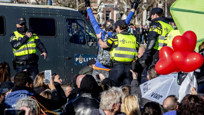 Riot police are seen clearing an anti-lockdown protest at the Museumplein on February 28, 2021 in Amsterdam, Netherlands.