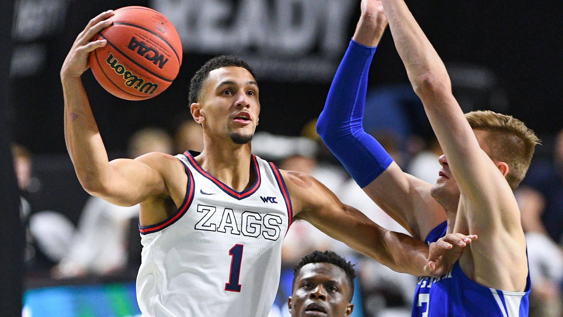 Gonzaga guard Jalen Suggs (1) drives to the basket against BYU forward Matt Haarms (3) during the championship game of the men's West Coast Conference basketball tournament between the BYU Cougars and the Gonzaga Bulldogs on March 9, 2021, at the Orleans Arena in Las Vegas, NV.