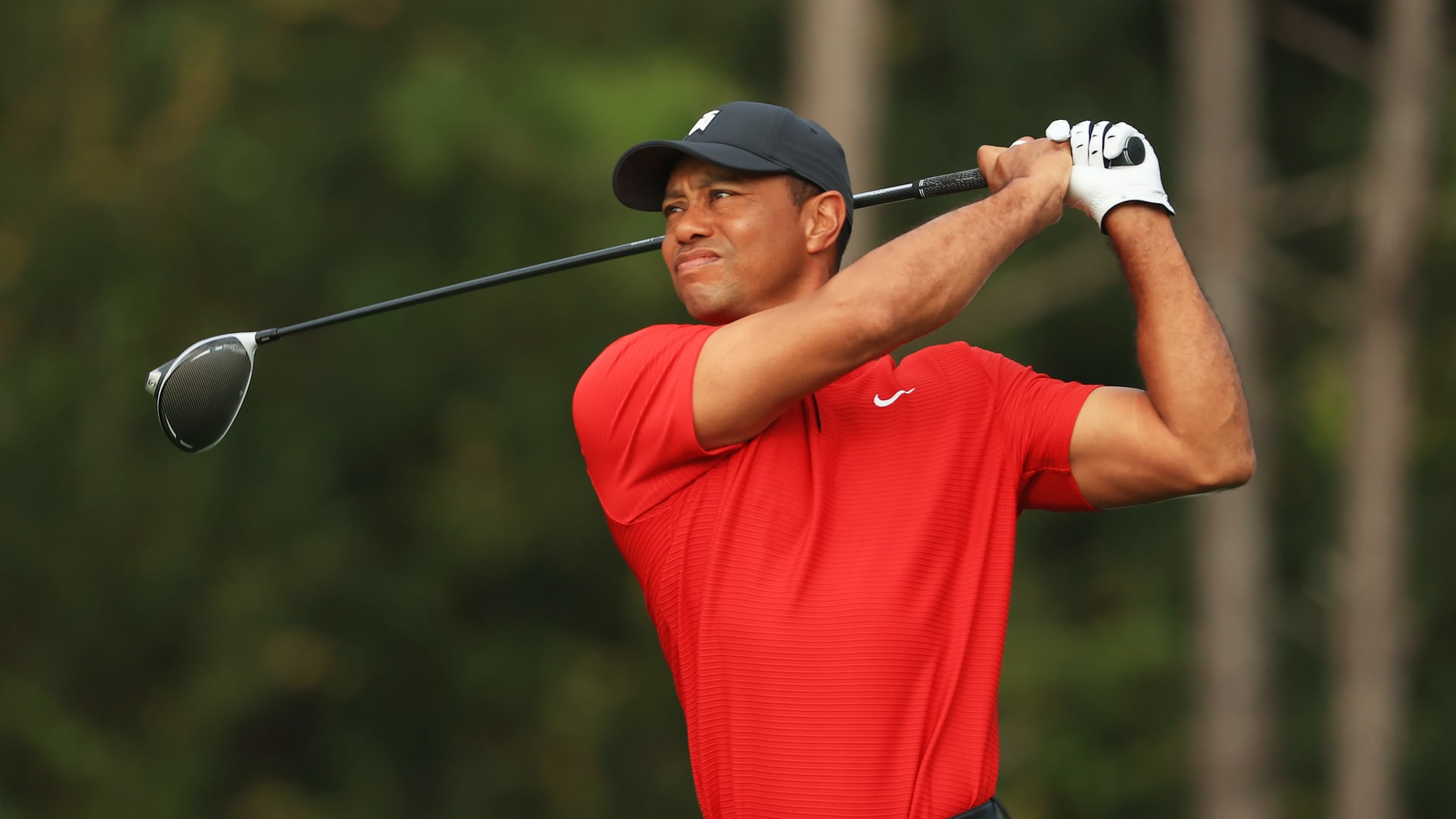 Tiger Woods returns to golf video games for the first time since 2013