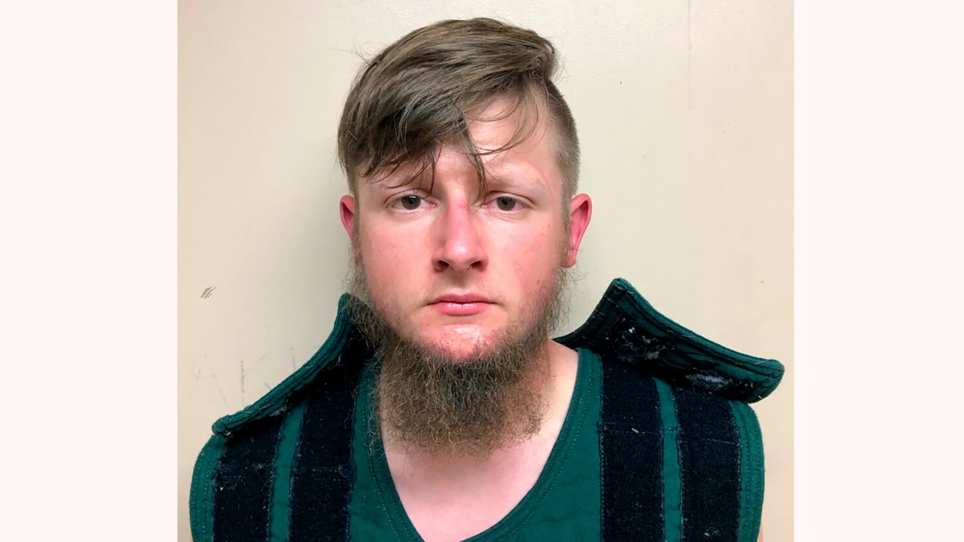 This booking photo provided by the Crisp County Sheriff's Office shows Robert Aaron Long on Tuesday, March 16, 2021. Long was arrested as a suspect in the fatal shootings of multiple people at three Atlanta-area massage parlors, most of them women of Asian descent, authorities said.