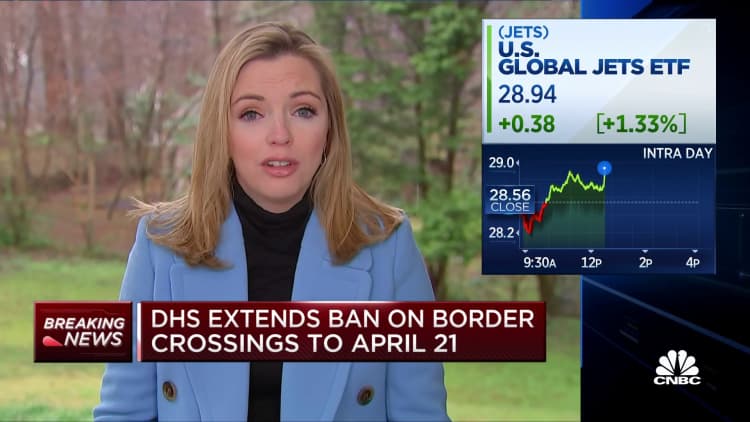 White House eyes to relax travel restrictions by mid-May, sources tell CNBC