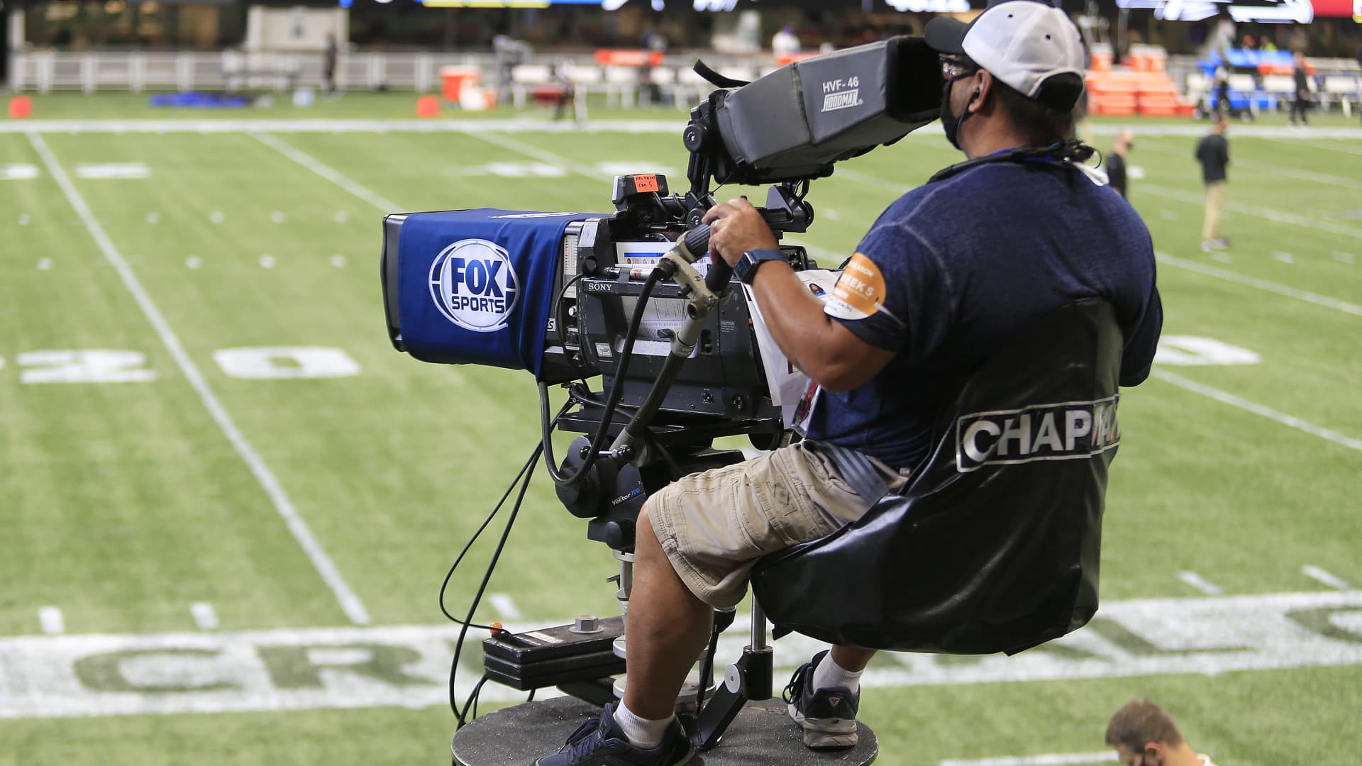 A FOX Sports TV camera operator during the week 5 NFL game between the Atlanta Falcons and the Carolina Panthers at Mercedes-Benz Stadium on October 11, 2020 in Atlanta, Georgia.
