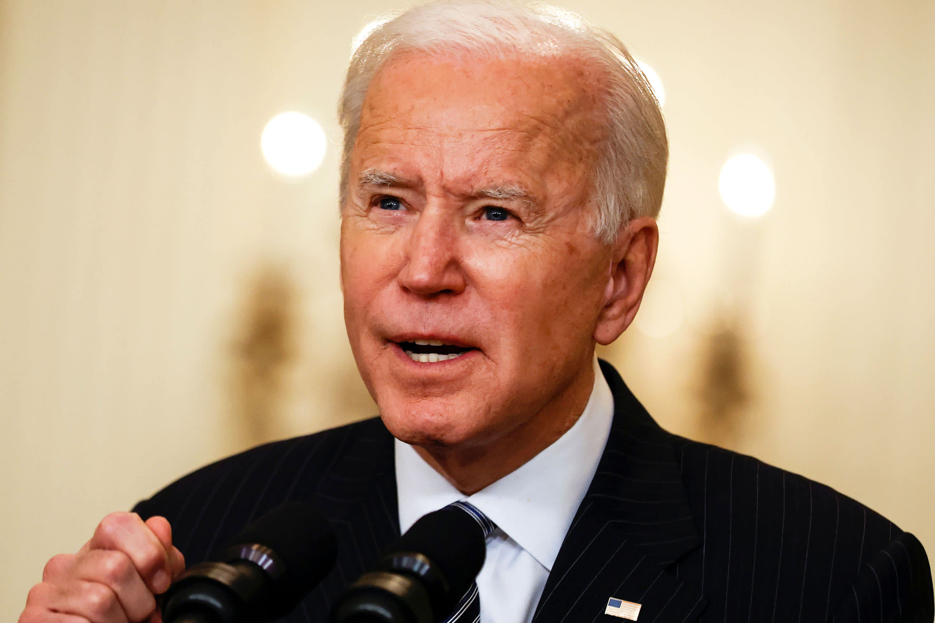 Biden’s closest advisers have ties to large companies, some of which earn millions