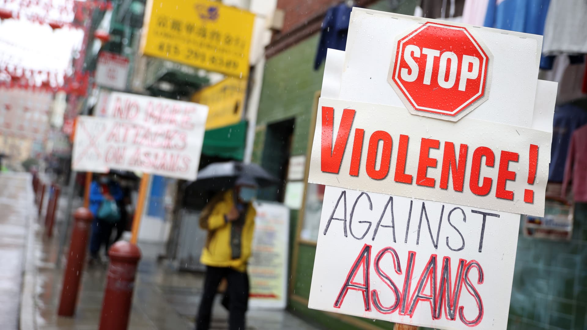 Signs against violence against Asians are posted in front of a store in Chinatown on March 18, 2021 in San Francisco, California.