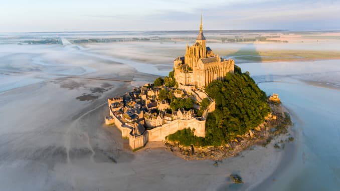 Though Normandy is relatively quiet, crowds are common at Mont Saint-Michel, a Gothic-style Benedictine abbey located less than a mile from the French mainland.