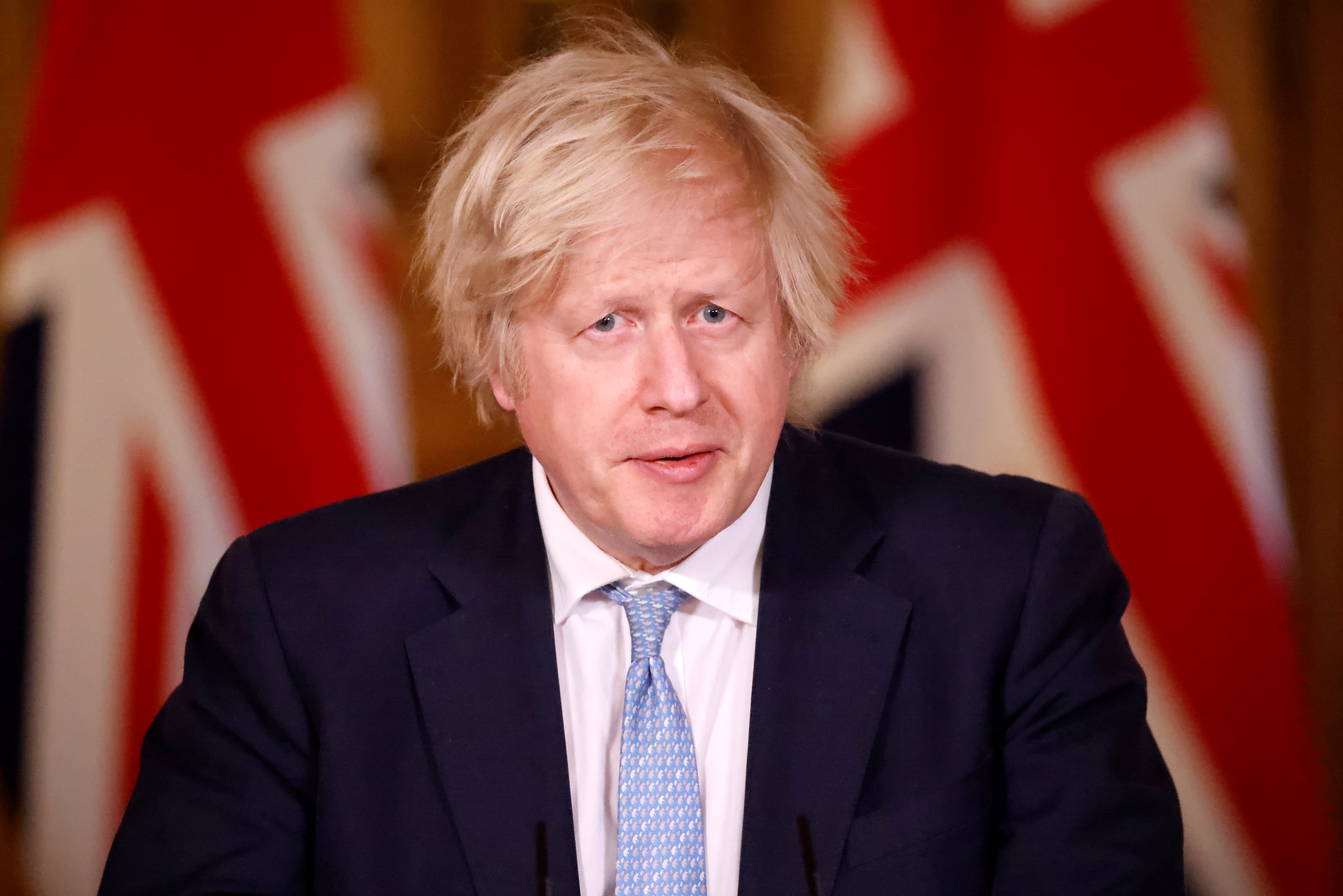 Britain’s Boris Johnson calls on others to get Covid vaccine
