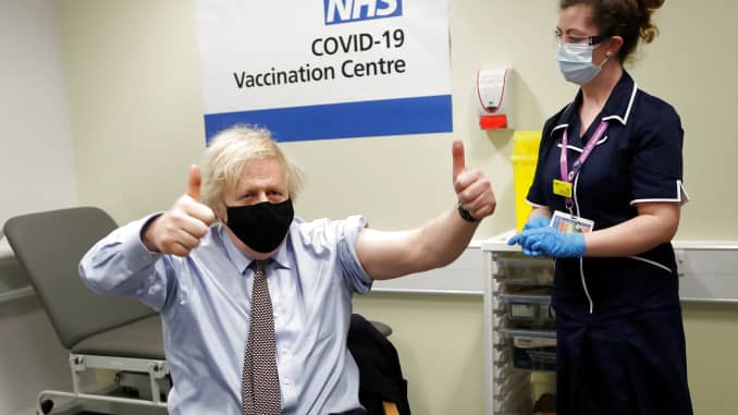 British Prime Minister Boris Johnson reacts after receiving a dose of the Oxford/AstraZeneca COVID-19 vaccine, amid the coronavirus disease pandemic, in London, Britain March 19, 2021.