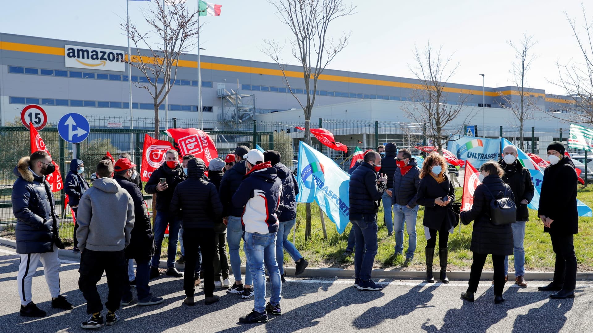 Workers at Amazon's logistics operations in Italy protest outside a distribution centre in Passo Corese, Italy March 22, 2021.