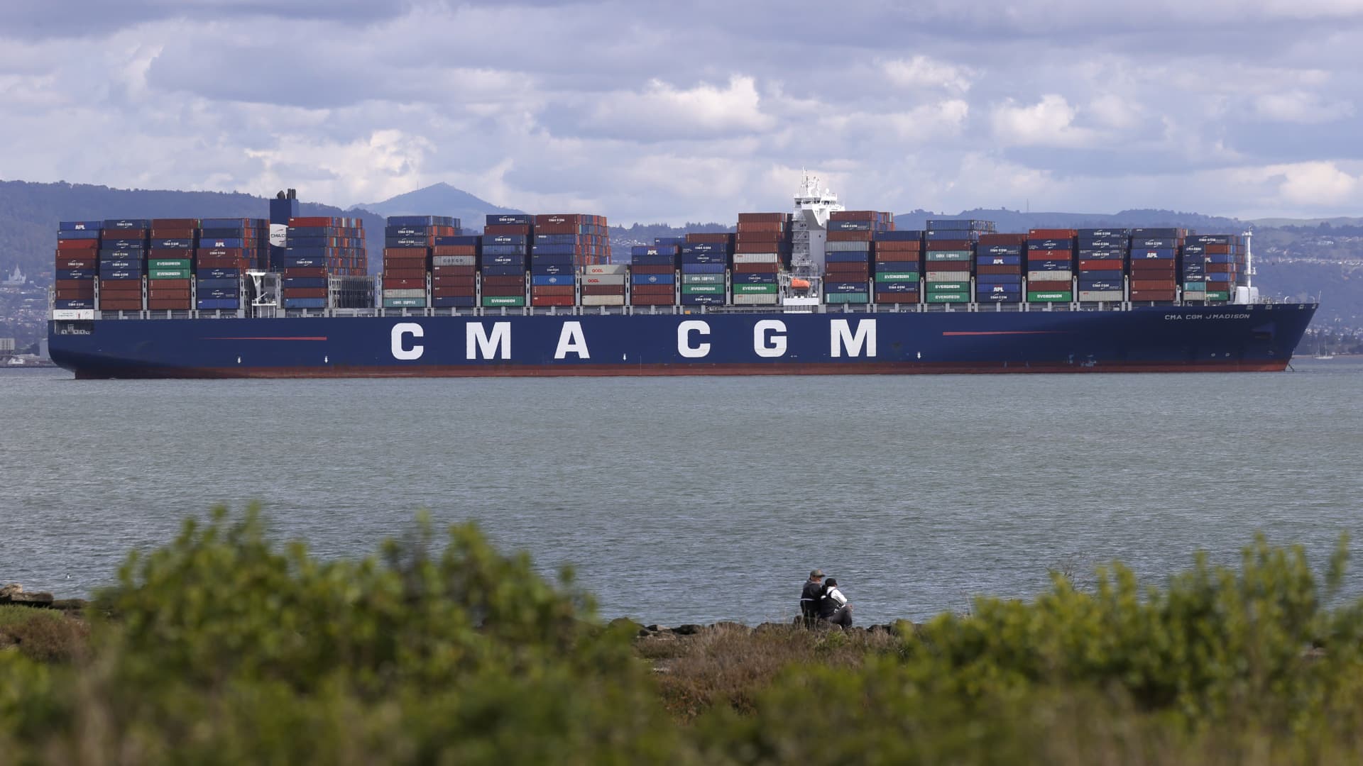 A fully loaded container ship sits anchored in the San Francisco Bay on March 09, 2021 in San Francisco, California. As the global pandemic has fueled online shopping and international shipping to fulfill orders, metal shipping containers have become scarce and have caused log jams at ports around the globe.