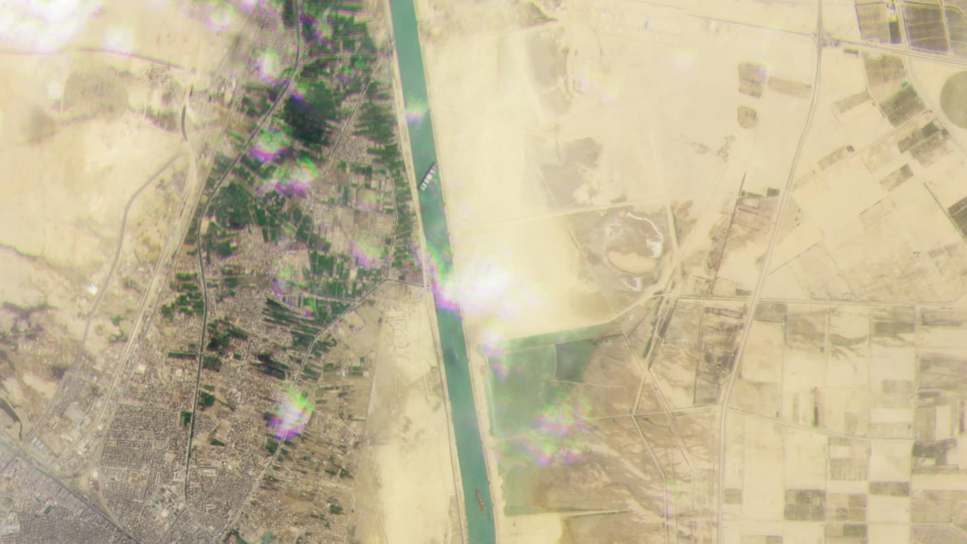 Satellite imagery captured on March 23, 2021 shows the cargo container ship Ever Given blocking the Suez Canal in Egypt.