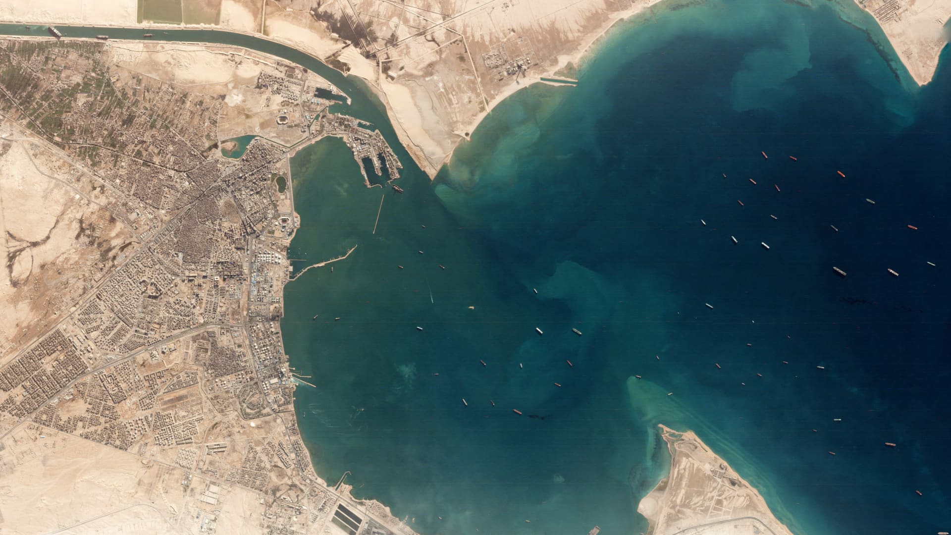 Planet Labs Satellite image showing shipping traffic halted due to the Ever Given container ship run aground (top left) in the canal.