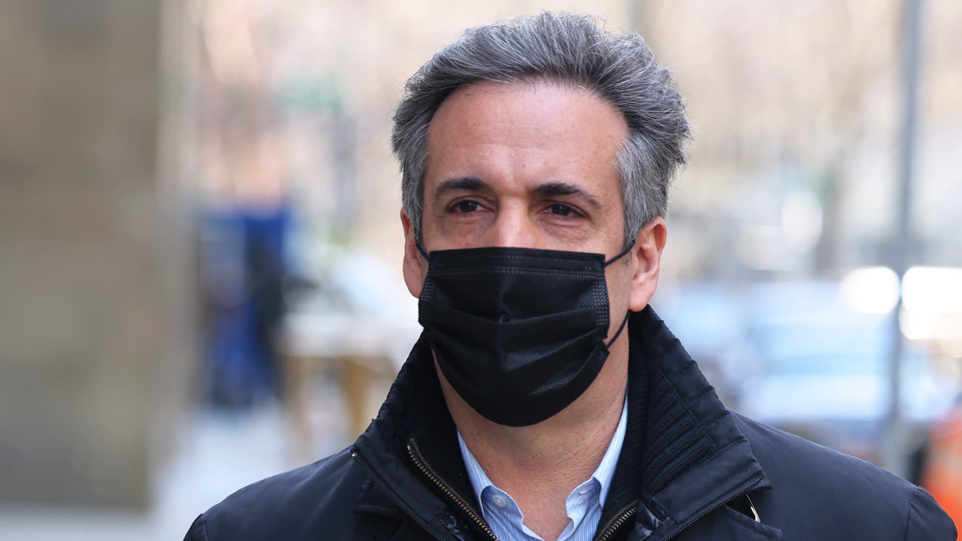 Michael Cohen walks after leaving the Manhattan district attorney’s office on March 19, 2021 in New York City.