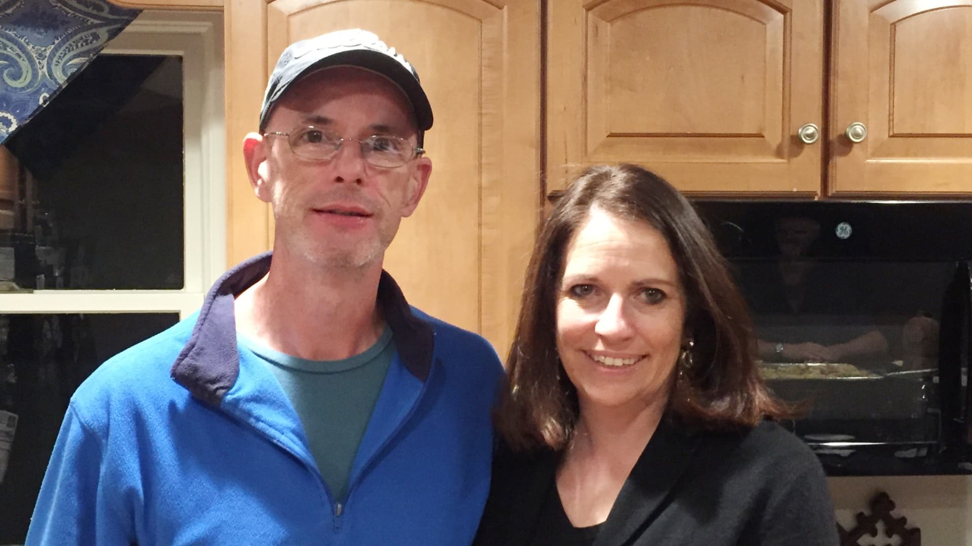 Liz O'Donnell, pictured with her late husband, started a Facebook community for caregivers after she found herself suddenly caring for both of her parents.