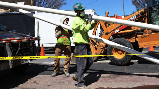 Construction worker make infrastructure repairs on the intersection of Church Avenue and Coney Island Avenue in the Flatbush neighborhood of Brooklyn borough on April 06, 2021 in New York City.
