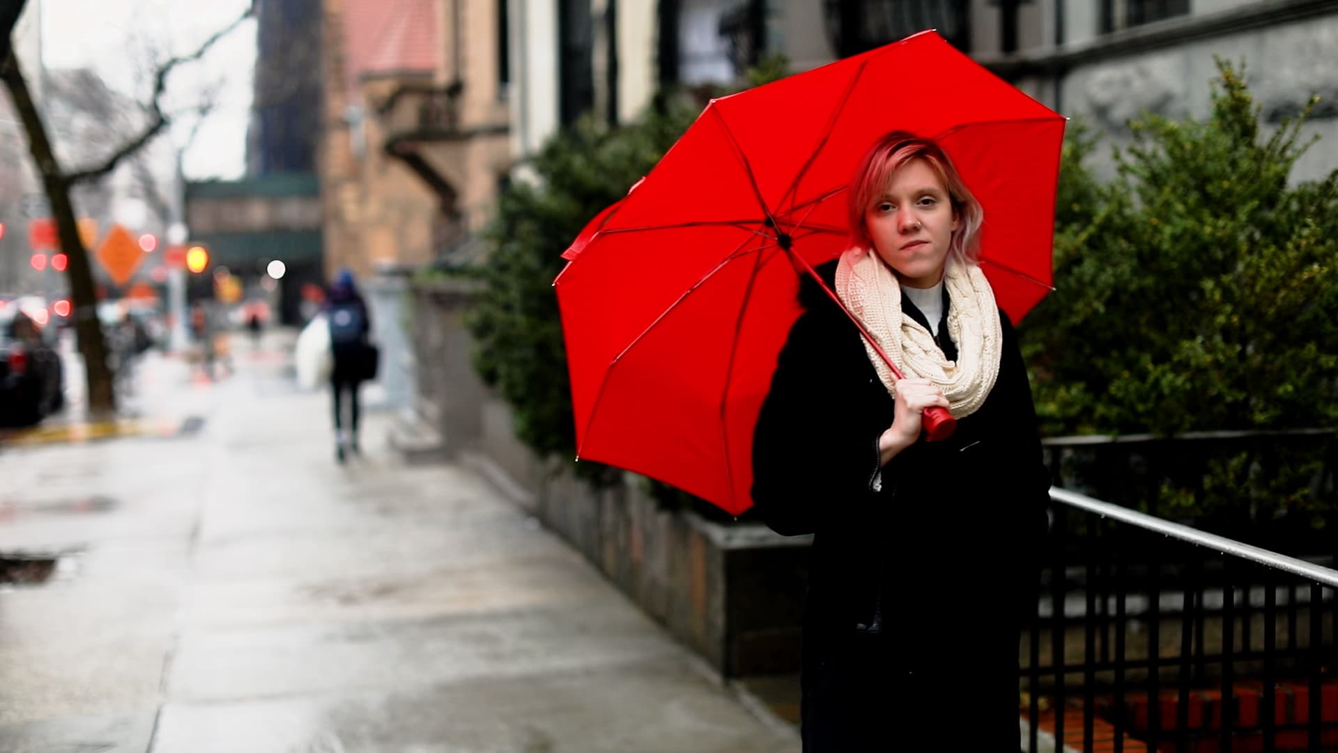 Emma Sadler walks along the Upper West Side in NYC. She's lived in this neighborhood since she was a child.