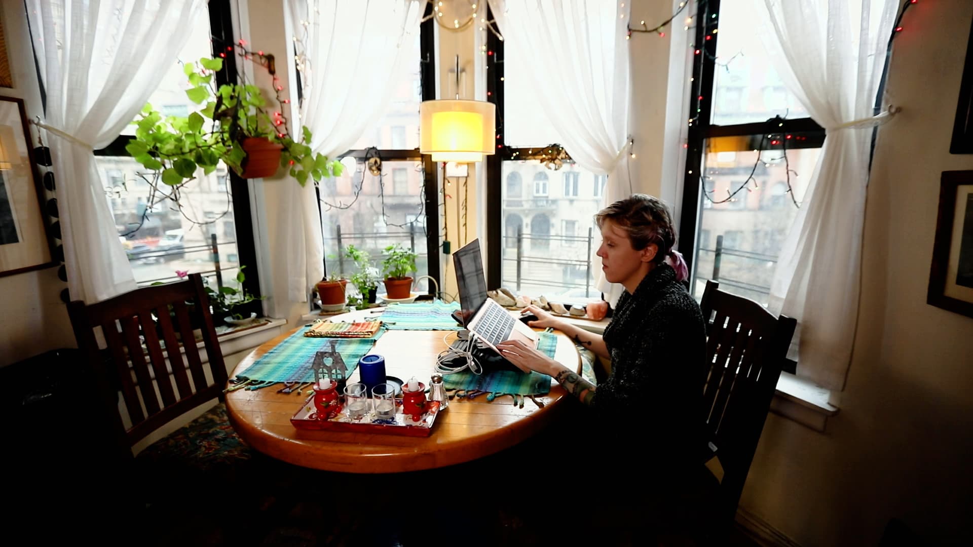 Emma Sadler works from the kitchen table of her Upper West Side apartment.