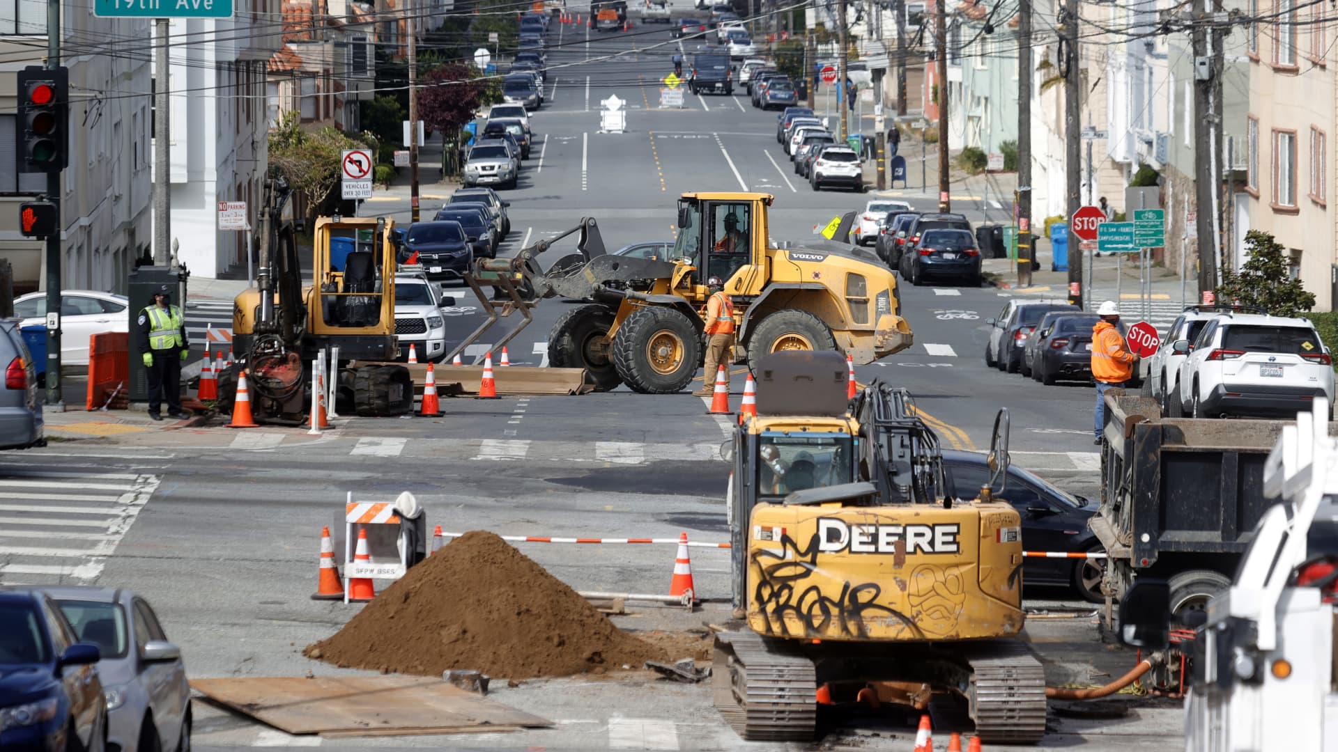 Workers operate a front loader as they make infrastructure repairs on April 07, 2021 in San Francisco, California.