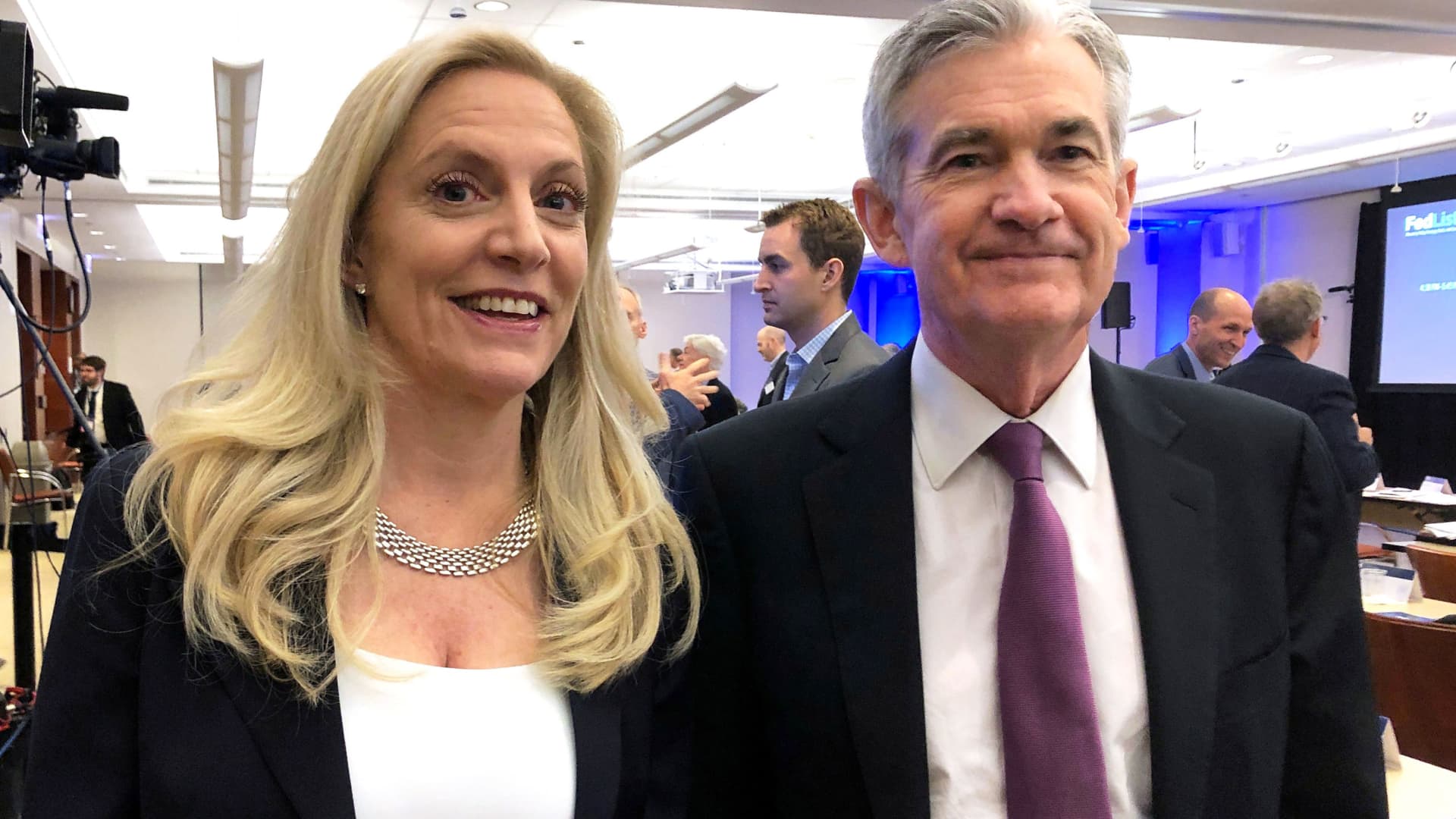 Federal Reserve Chairman Jerome Powell poses for photos with Fed Governor Lael Brainard (L) at the Federal Reserve Bank of Chicago, in Chicago, Illinois, U.S., June 4, 2019.