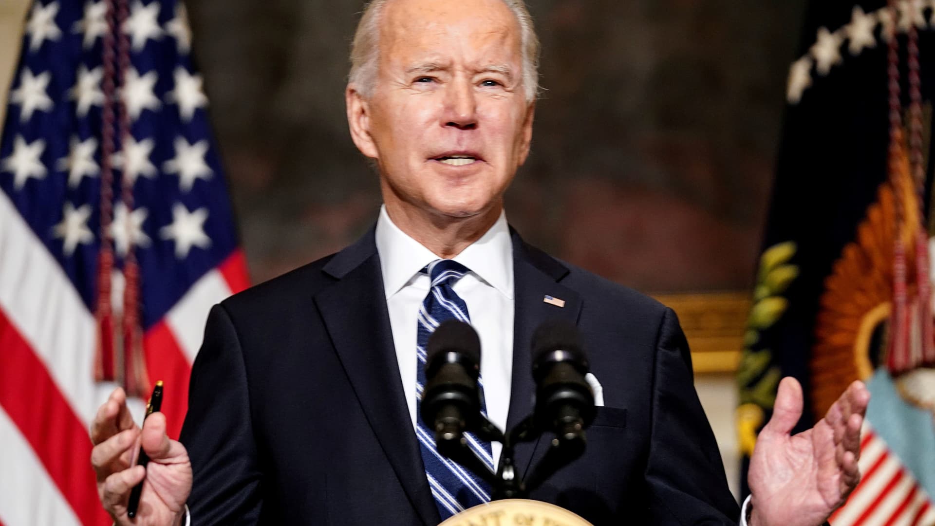 U.S. President Joe Biden delivers remarks on tackling climate change prior to signing executive actions in the State Dining Room at the White House in Washington, January 27, 2021.