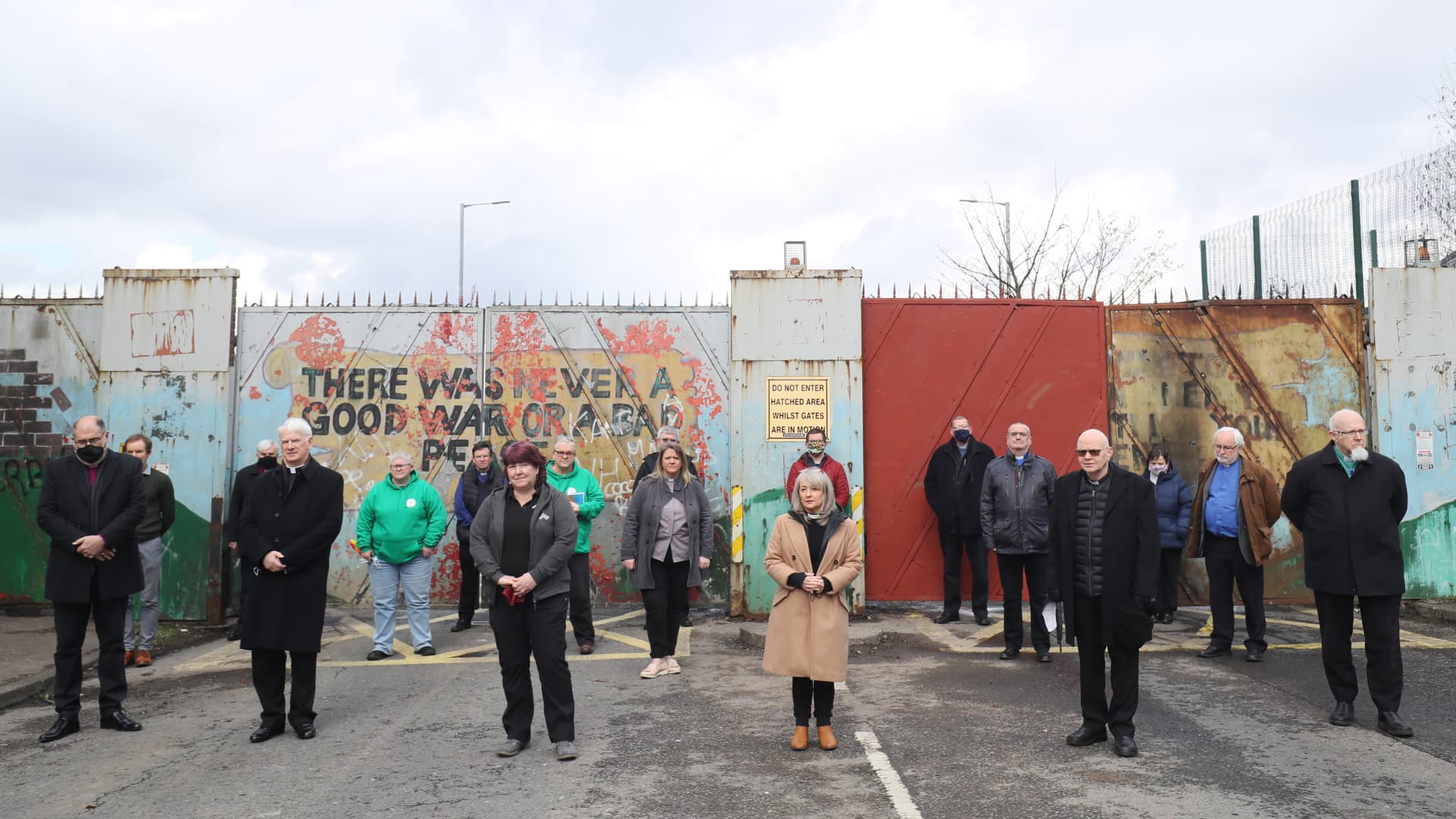 BELFAST - Members of the clergy at the peace wall on Lanark Way in Belfast following a Ecumencial service in response to the recent riots and violence in the city