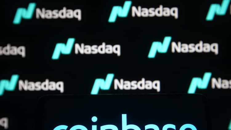 Coinbase opened at $381 a share, up 52% from its reference price — Here's what investors are saying now
