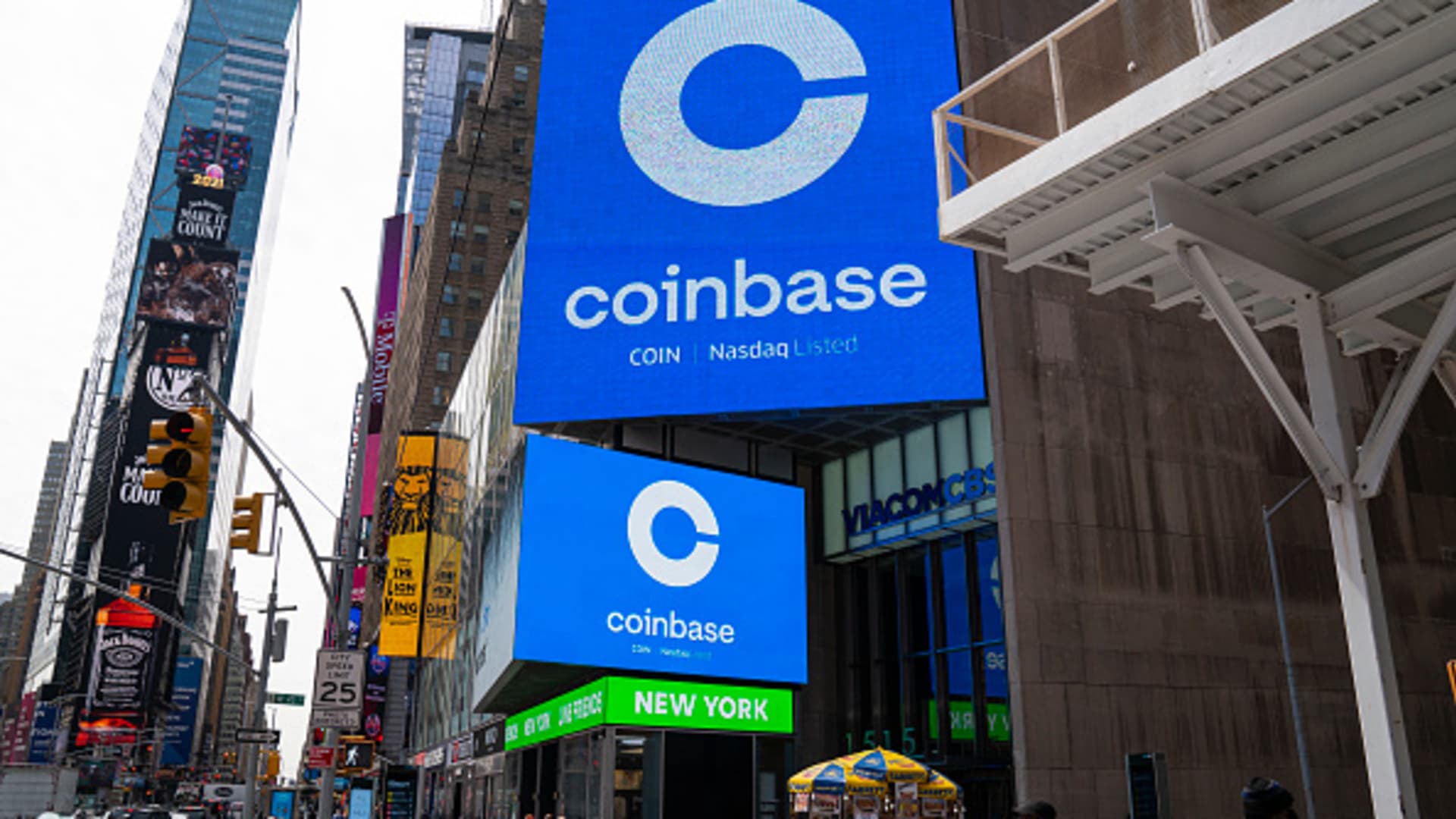 Coinbase signage in New York's Times Square during the company's initial public offering on the Nasdaq on April 14, 2021.