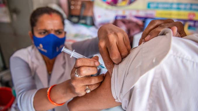 A man gets vaccinated at the Urban Primary Health Center in Uttar Pradesh, India.