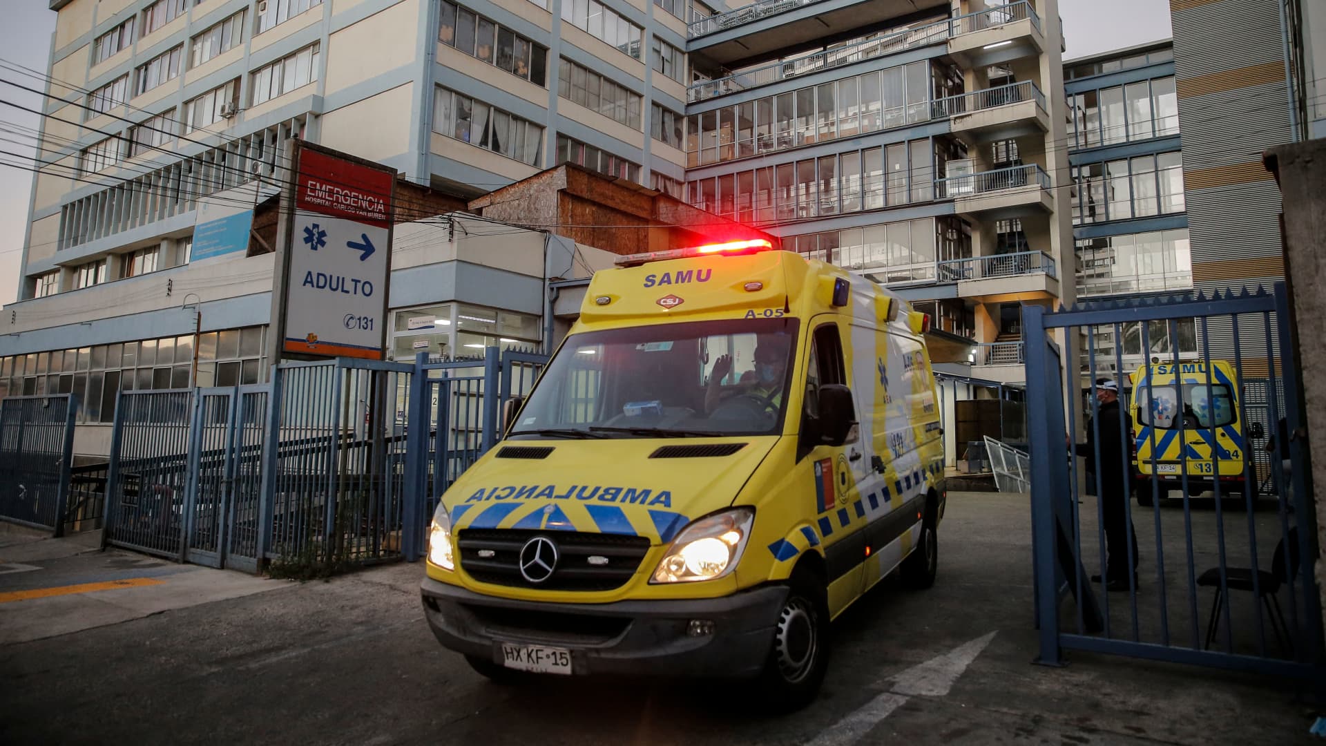 An ambulance leaves the Carlos Van Buren Hospital, which is overwhelmed by the large number of Covid-19 positive cases, in Valparaiso, Chile on April 6, 2021.