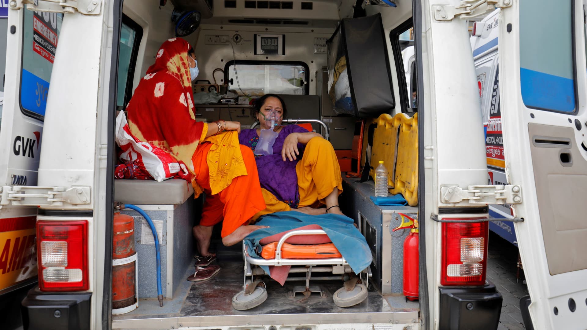 A patient with breathing problem is seen inside an ambulance waiting to enter a COVID-19 hospital for treatment, amidst the spread of the coronavirus disease (COVID-19) in Ahmedabad, India, April 20, 2021.