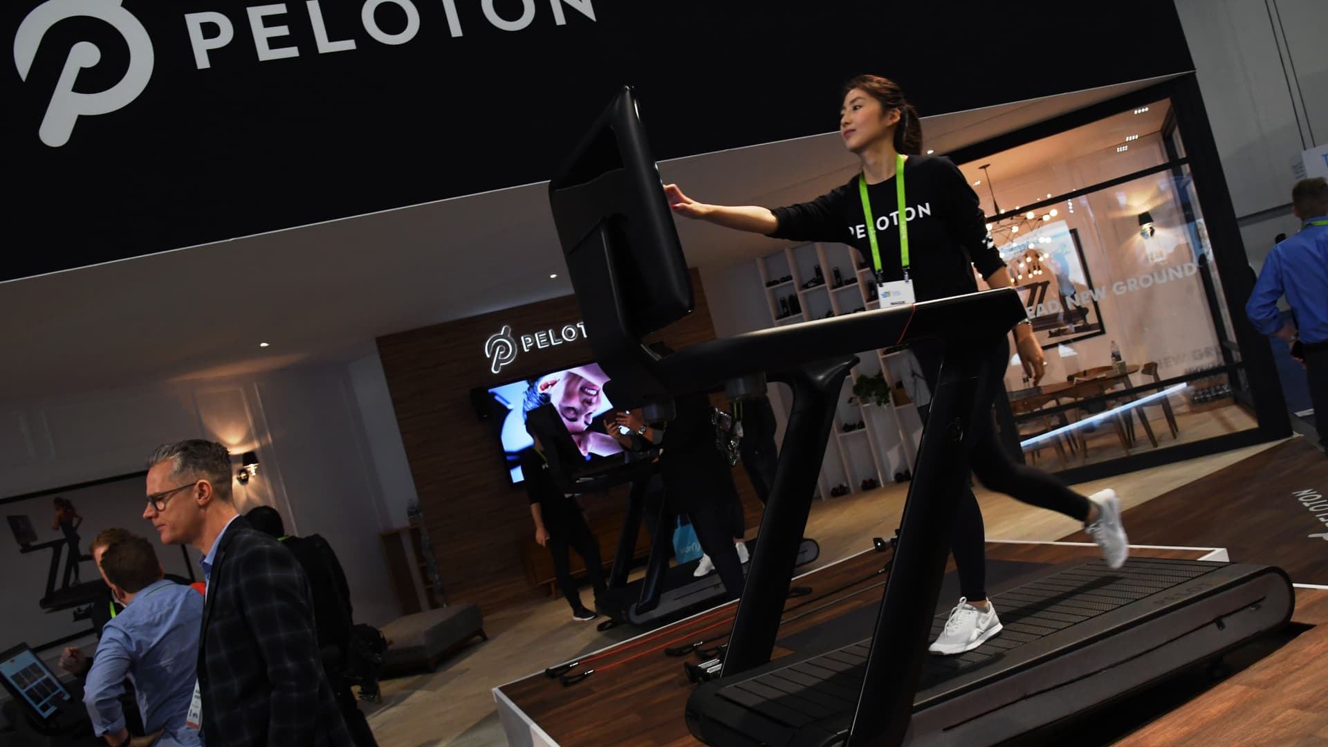 Maggie Lu uses a Peloton Tread treadmill during CES 2018 at the Las Vegas Convention Center on January 11, 2018 in Las Vegas, Nevada.