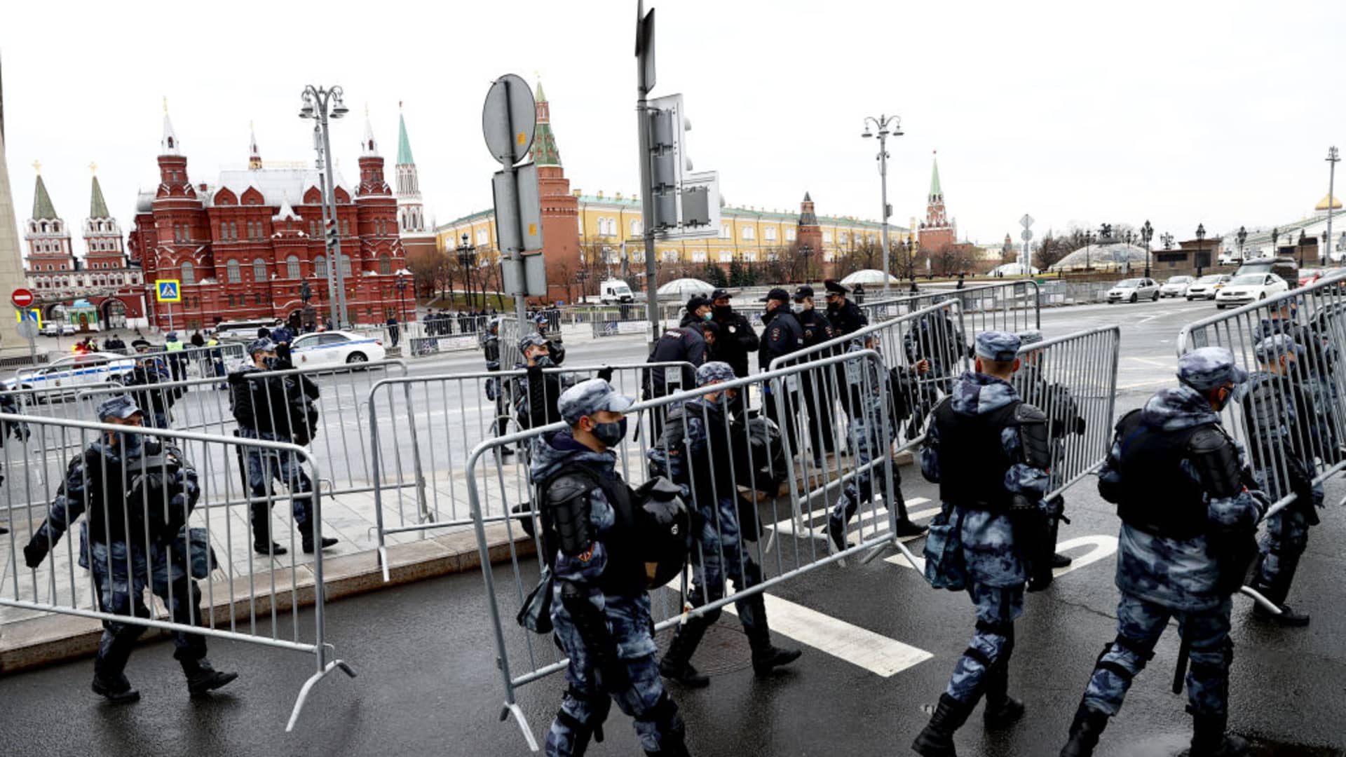 Russian police officers stand guard around the Kremlin Palace and Red Square on April 21, 2021.