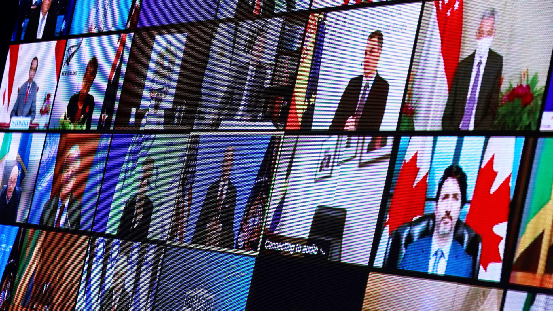 World leaders appear on screen during a virtual Climate Summit, seen from the East Room at the White House in Washington, U.S., April 22, 2021.