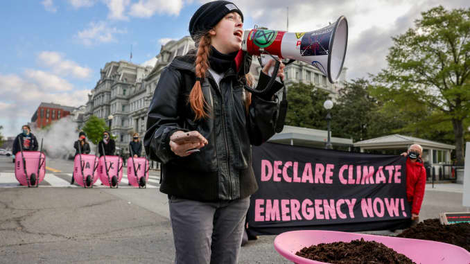 Extinction Rebellion DC blocks 17th Street after dumping cow manure outside the White House on Earth Day to protest President Biden?s climate plan in Washington, April 22, 2021.