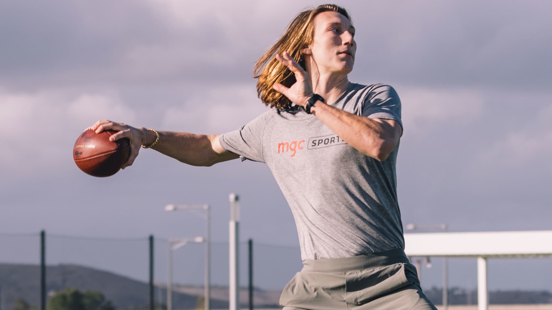 Quarterback Trevor Lawrence sets up for a throw during Jordan Palmer's QB Summit NFL Draft Prep in a park on January 25, 2021 in Orange County, CA.