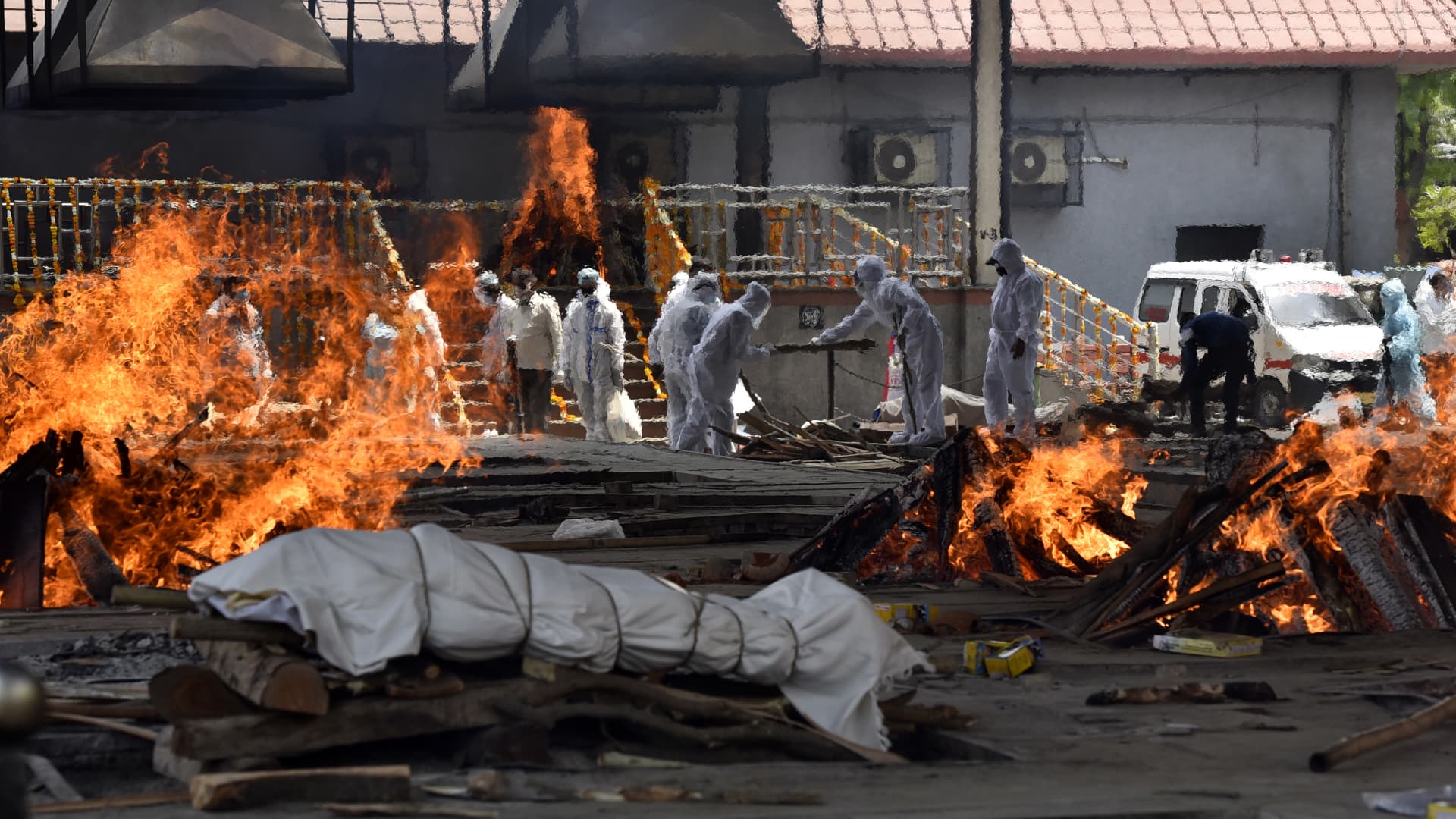A view of multiple funeral pyres of Covid-19 victims, at Nigambodh Ghat crematorium, on April 23, 2021 in New Delhi, India.