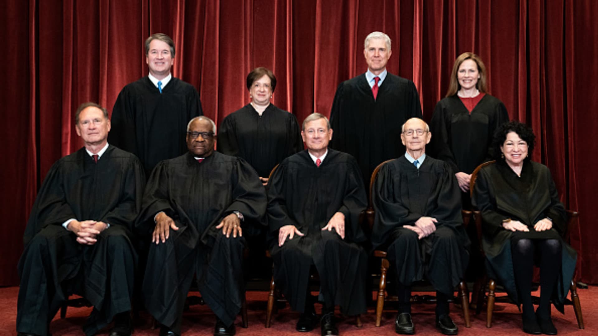 Members of the Supreme Court pose for a group photo at the Supreme Court in Washington, DC on April 23, 2021. Seated from left: Associate Justice Samuel Alito, Associate Justice Clarence Thomas, Chief Justice John Roberts, Associate Justice Stephen Breyer and Associate Justice Sonia Sotomayor, Standing from left: Associate Justice Brett Kavanaugh, Associate Justice Elena Kagan, Associate Justice Neil Gorsuch and Associate Justice Amy Coney Barrett.
