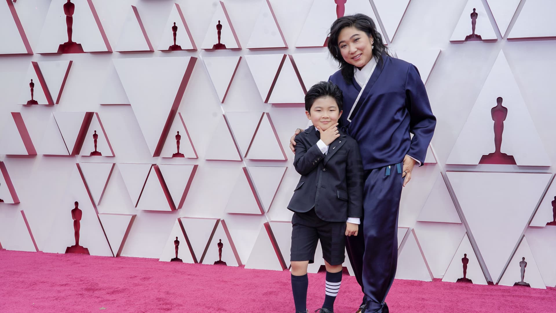 (L-R) Alan S. Kim and Christina Oh attend the 93rd Annual Academy Awards at Union Station on April 25, 2021 in Los Angeles, California.