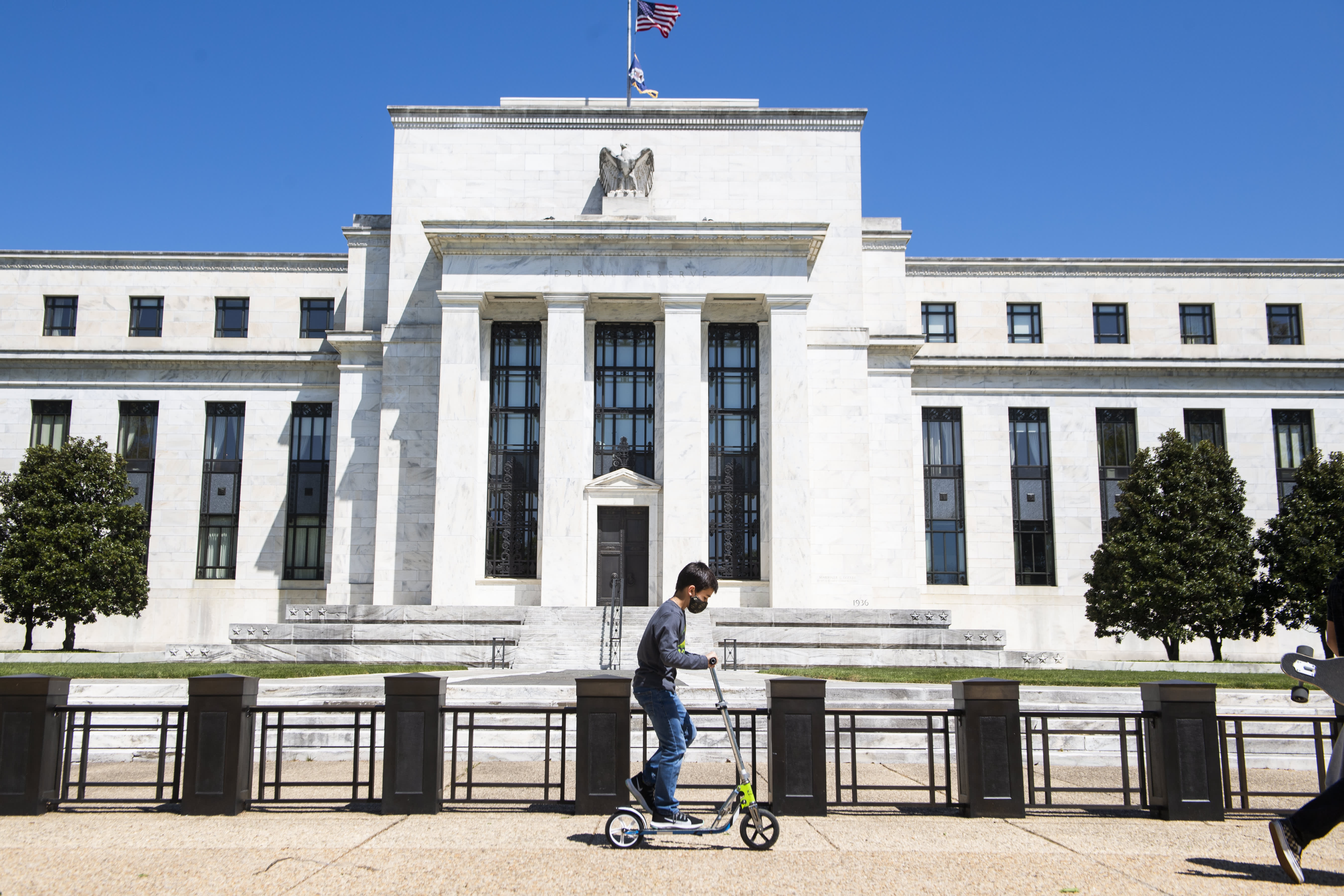 The majority of Fed members forecast three interest rate hikes in 2022 to fight inflation