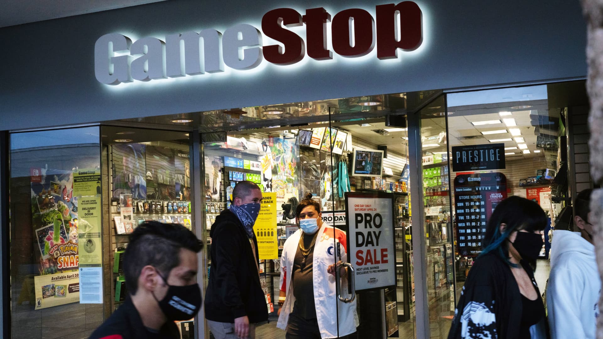 A person wearing a protective mask exits from a GameStop Corp. store at a mall in San Diego, California, on Thursday, April 22, 2021.