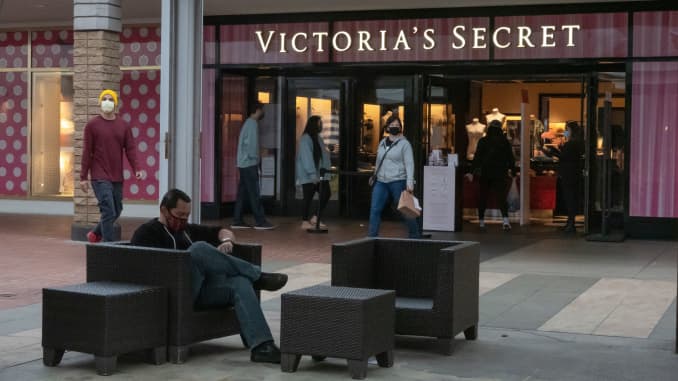 Shoppers pass in front of a Victoria's Secret store at a mall in San Diego, California, April 22, 2021.