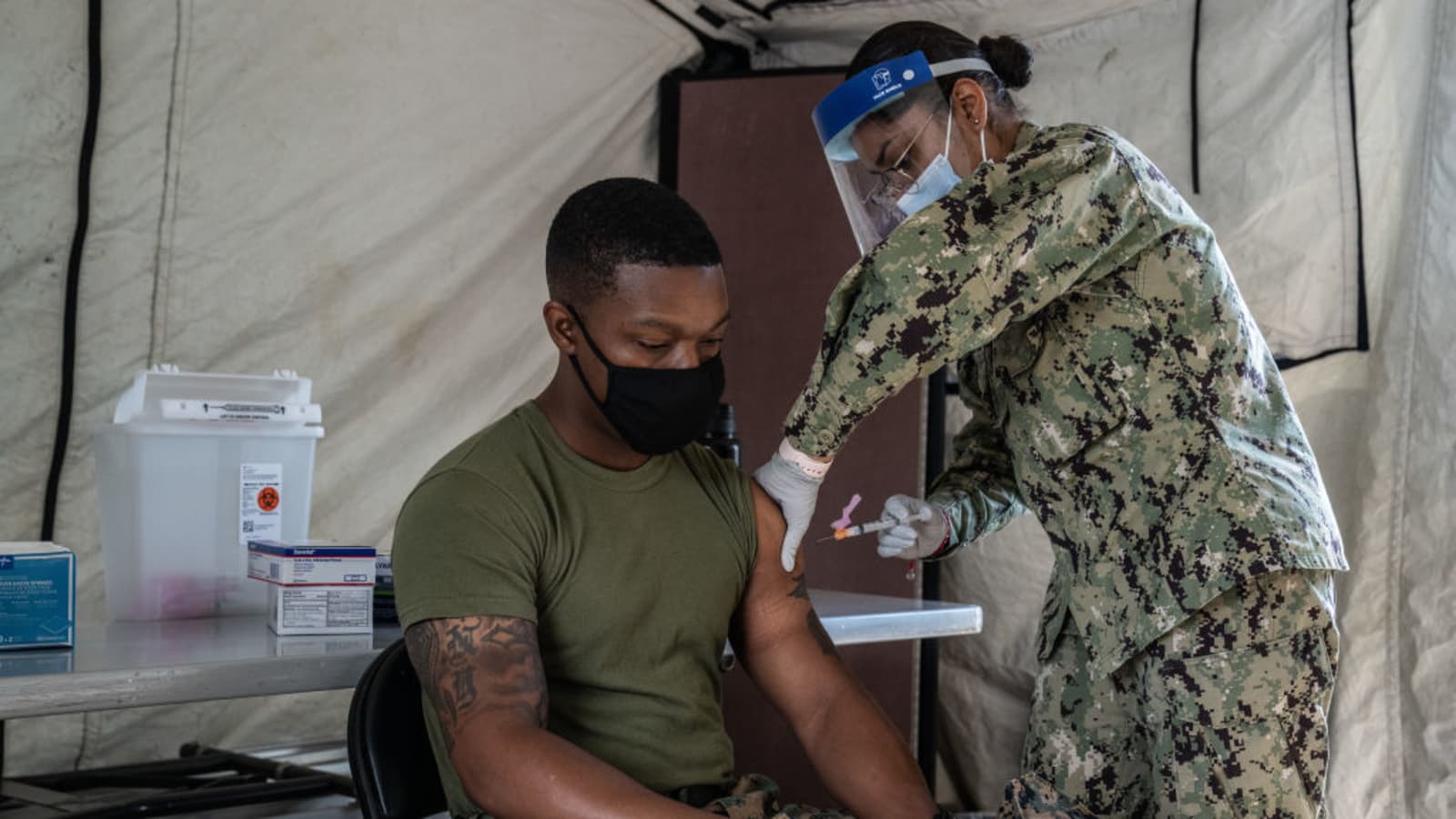 Pentagon to require all service members to get Covid vaccine by mid-September