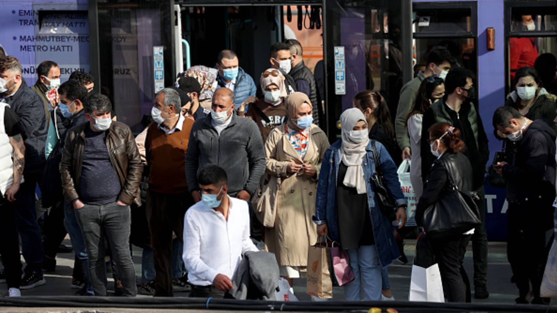 ISTANBUL, TURKEY - APRIL 29: People wait in a queue at Cevizlibag district to get on metrobuses and trams to return their homes ahead of full lockdown from Thursday evening until May 17 to stem the spread of coronavirus in Istanbul, Turkey on April 29, 2021. (Photo by Isa Terli/Anadolu Agency via Getty Images)