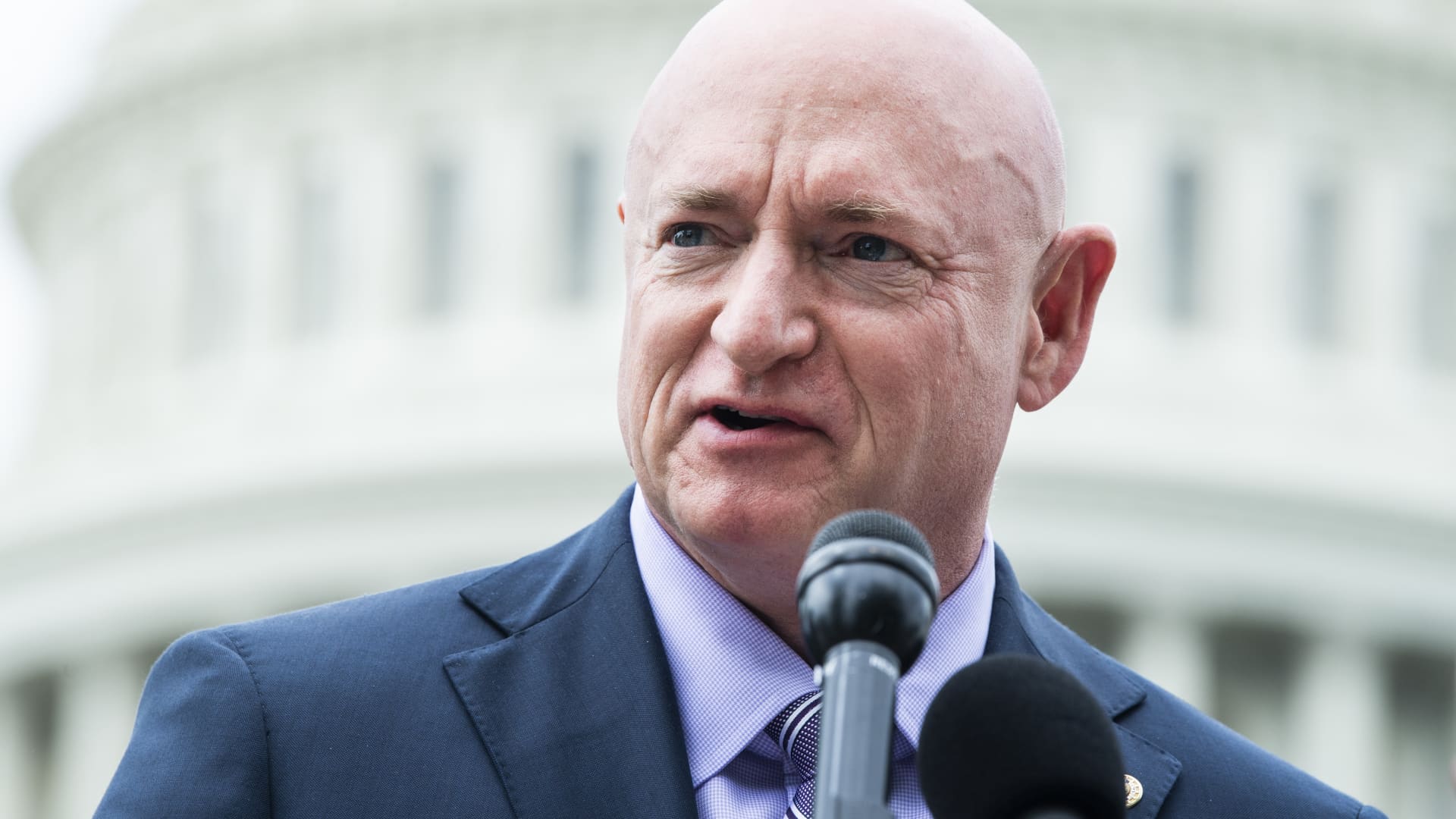 Sen. Mark Kelly, D-Ariz., conducts a news conference outside the Capitol to discuss the Military Justice Improvement and Increasing Prevention Act, which would remove serious crime prosecution out of the chain of command, on Thursday, April 29, 2021.